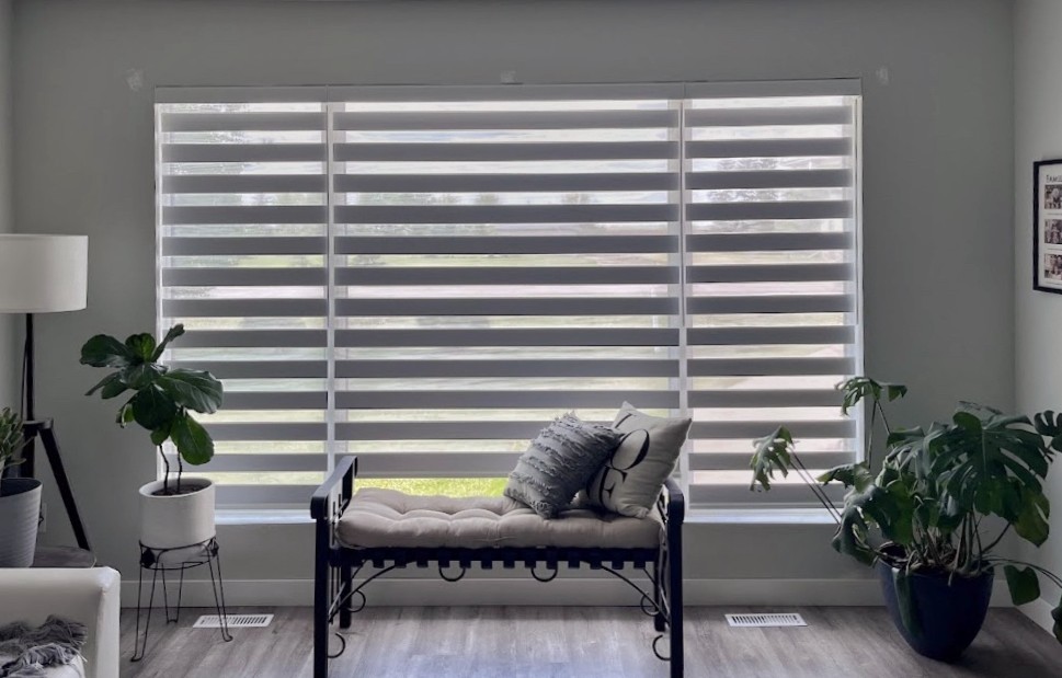 Large zebra shades installation in living room